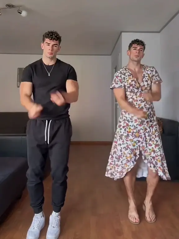 Scene preview: matching dancers in a dark outfit on the left and a floral wrap dress on the right
